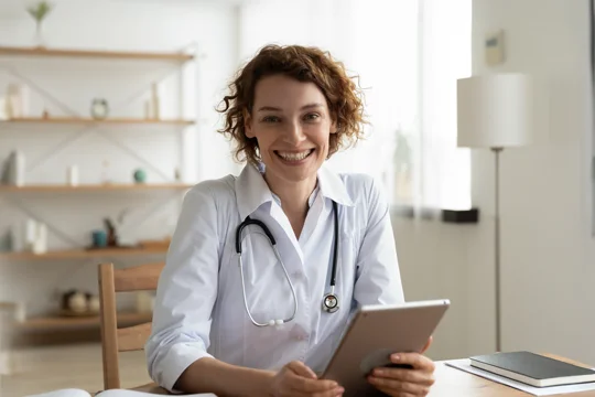 a doctor at a desk