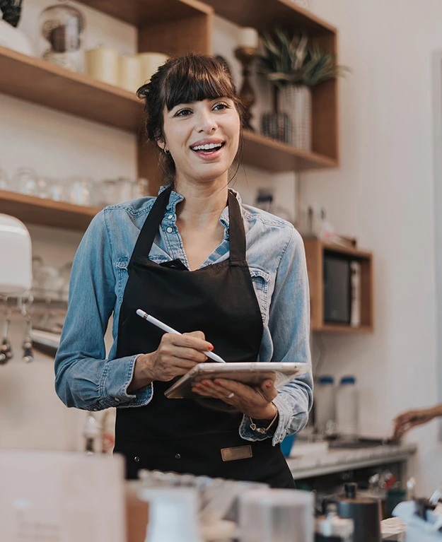 A woman in her coffee shop