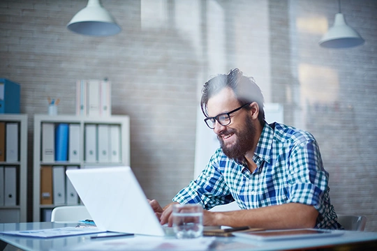 a man working on his laptop