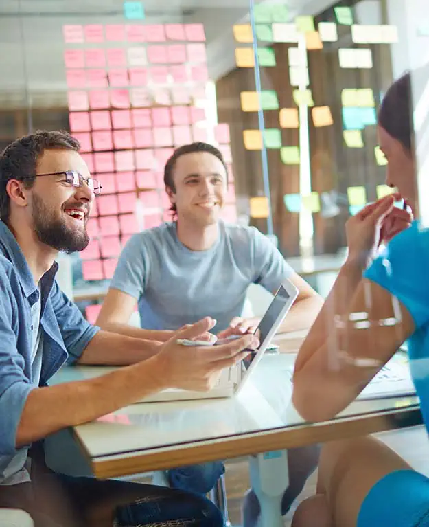 three young people talking to each other