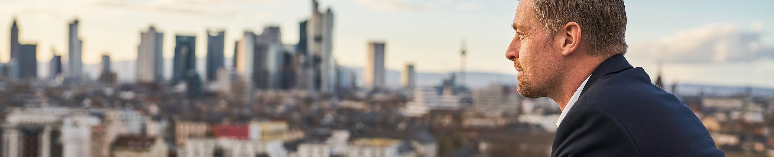 A man looks down on a city