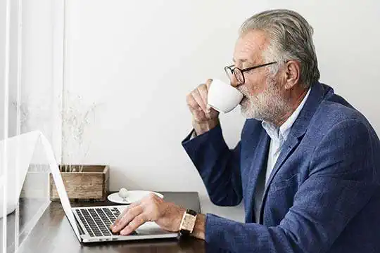 Senior Man Working Coffee Shop Relaxation Concept